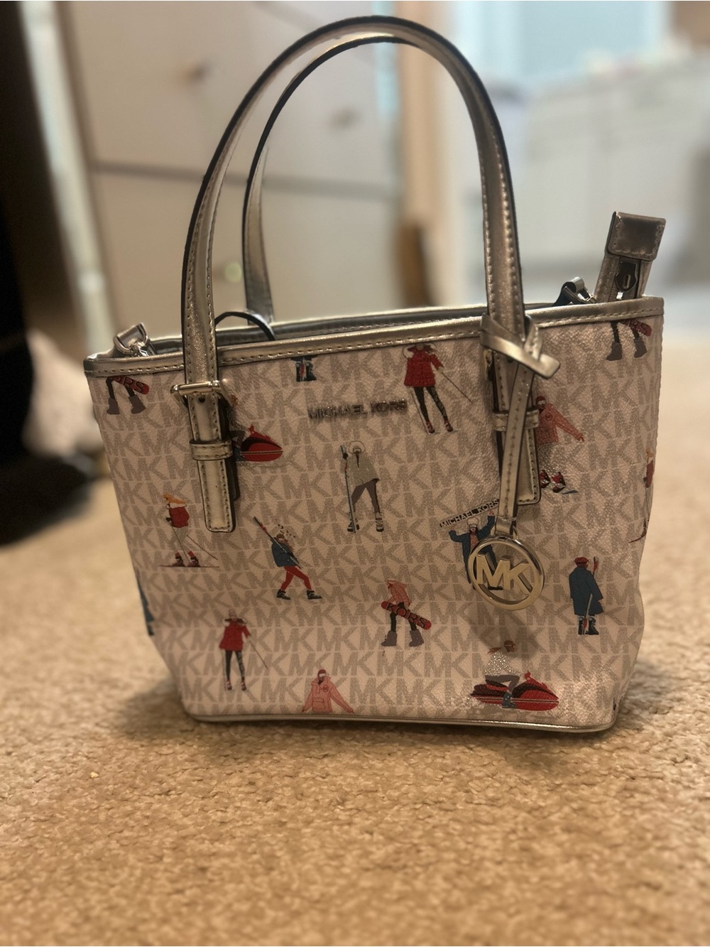 Michael Kors Cream Logo Satchel with Silver Trim and Multicolor Figure Print